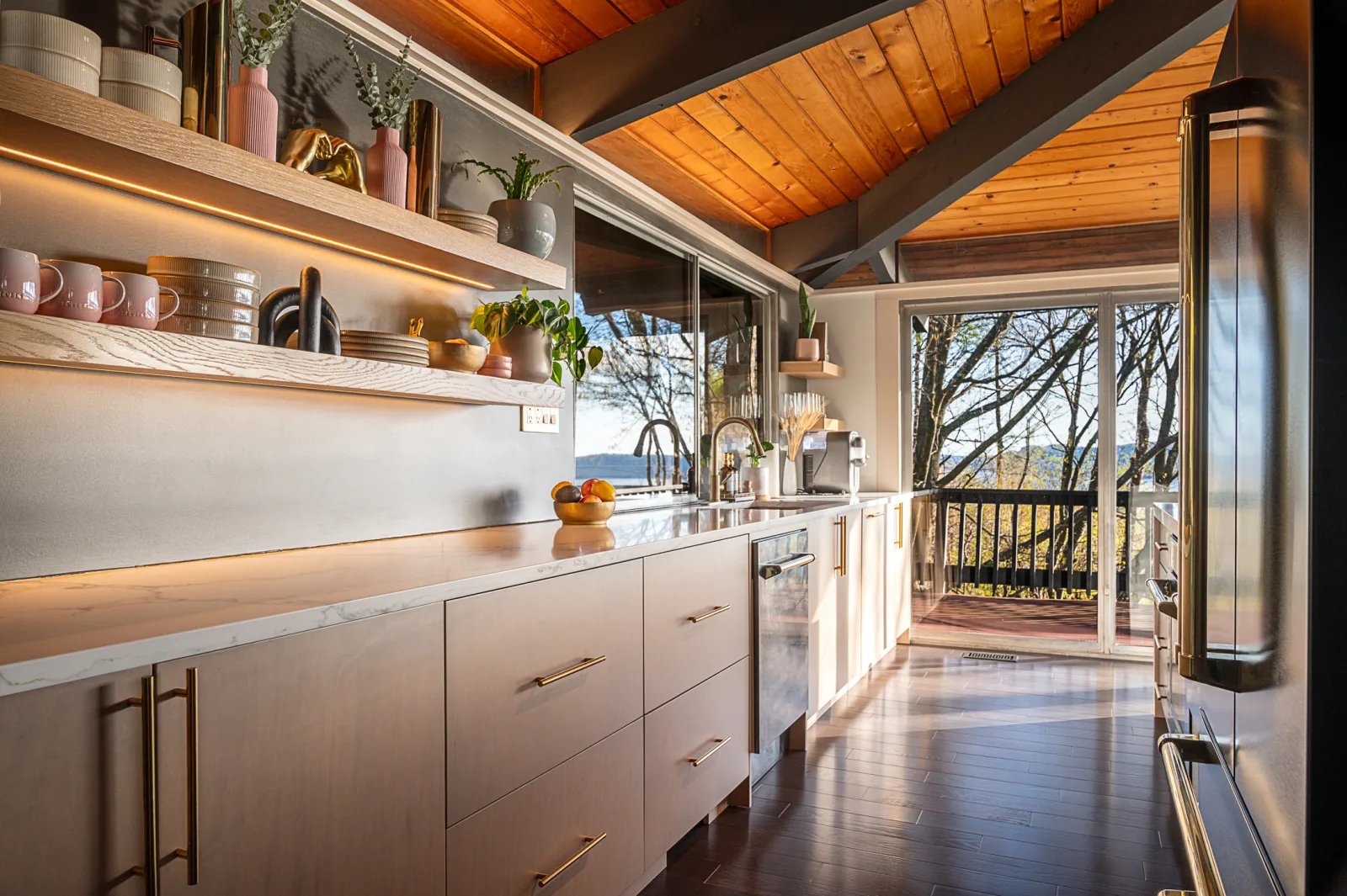 Modern kitchen cabinetry and long countertop wall in a Connecticut home