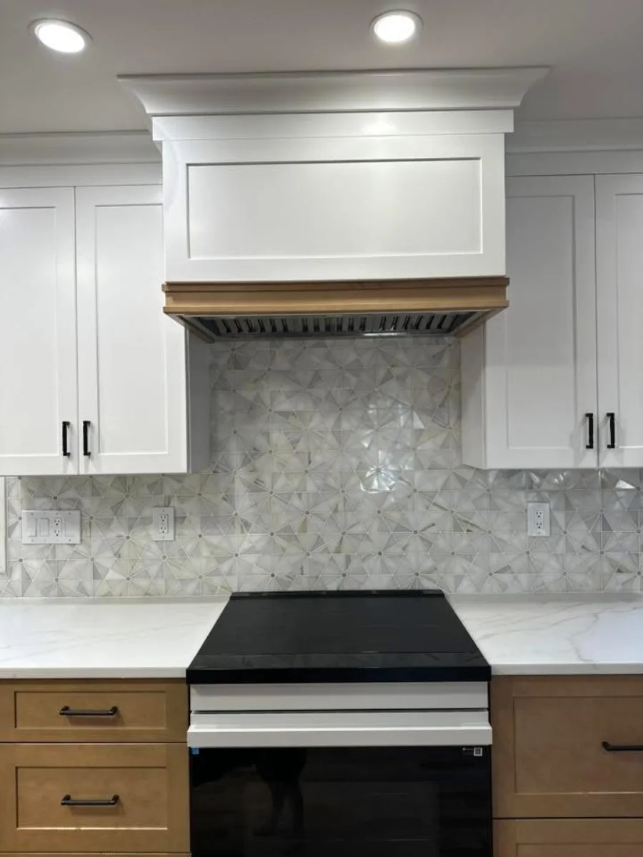 Residential kitchen backsplash and custom hood surround detail